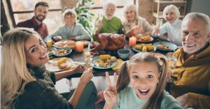 cheers photo of big family sit feast dishes table roasted turkey picture id1179005643