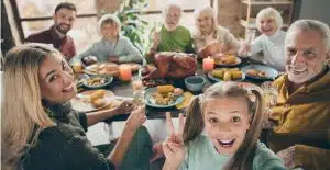 cheers photo of big family sit feast dishes table roasted turkey picture id1179005643