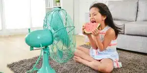 child eating watermelon with two hands picture id1040941164