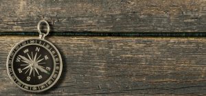 compass on an old wooden background picture id1009113024