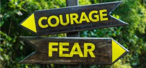courage fear signpost picture id688744906