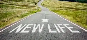 new life sign on a country side road