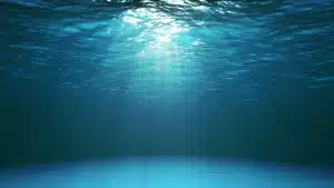 Dark blue ocean surface seen from underwater