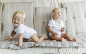 toddlers on couch
